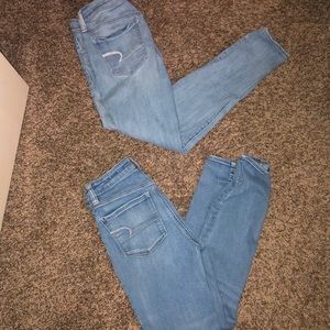 two pairs of american eagle light wash jeggings